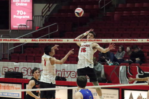 Freshman David Flores (Left) and freshman Wil McPhillips (Right) prepare to spike the ball over the net in the Ball State vs. Urbana Men’s Volleyball game in Worthen Arena in Muncie, IN on Thursday, Feb. 6, 2020 (Jennifer McGowen). 
